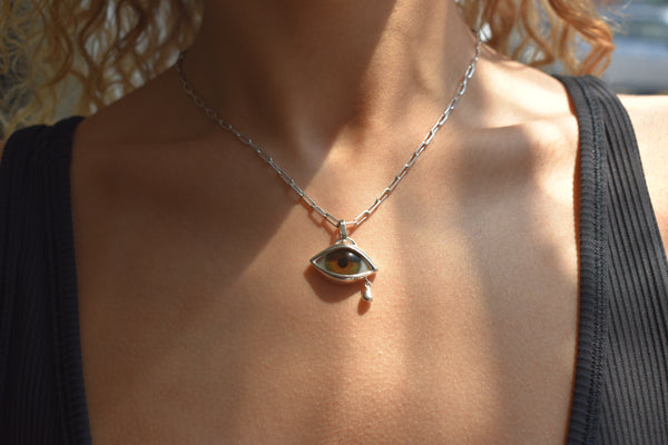 Crying brown Eye Pendant