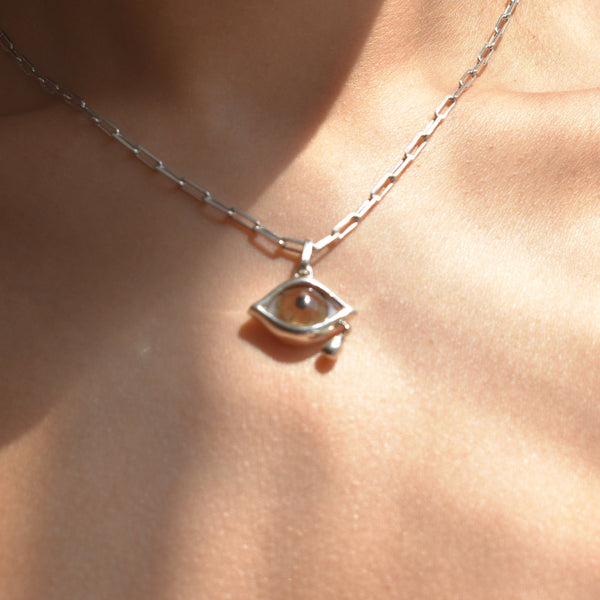 Crying Light Brown Eye Pendant