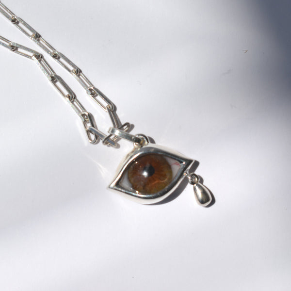 Crying Light Brown Eye Pendant