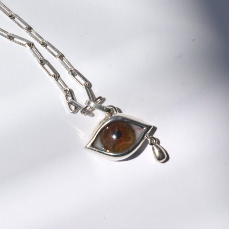 Crying Light Brown Eye Pendant