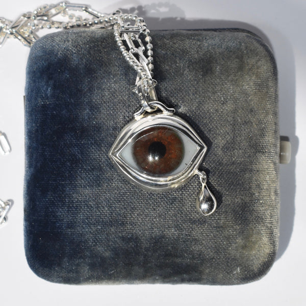 Crying Brown Silver Eye Pendant