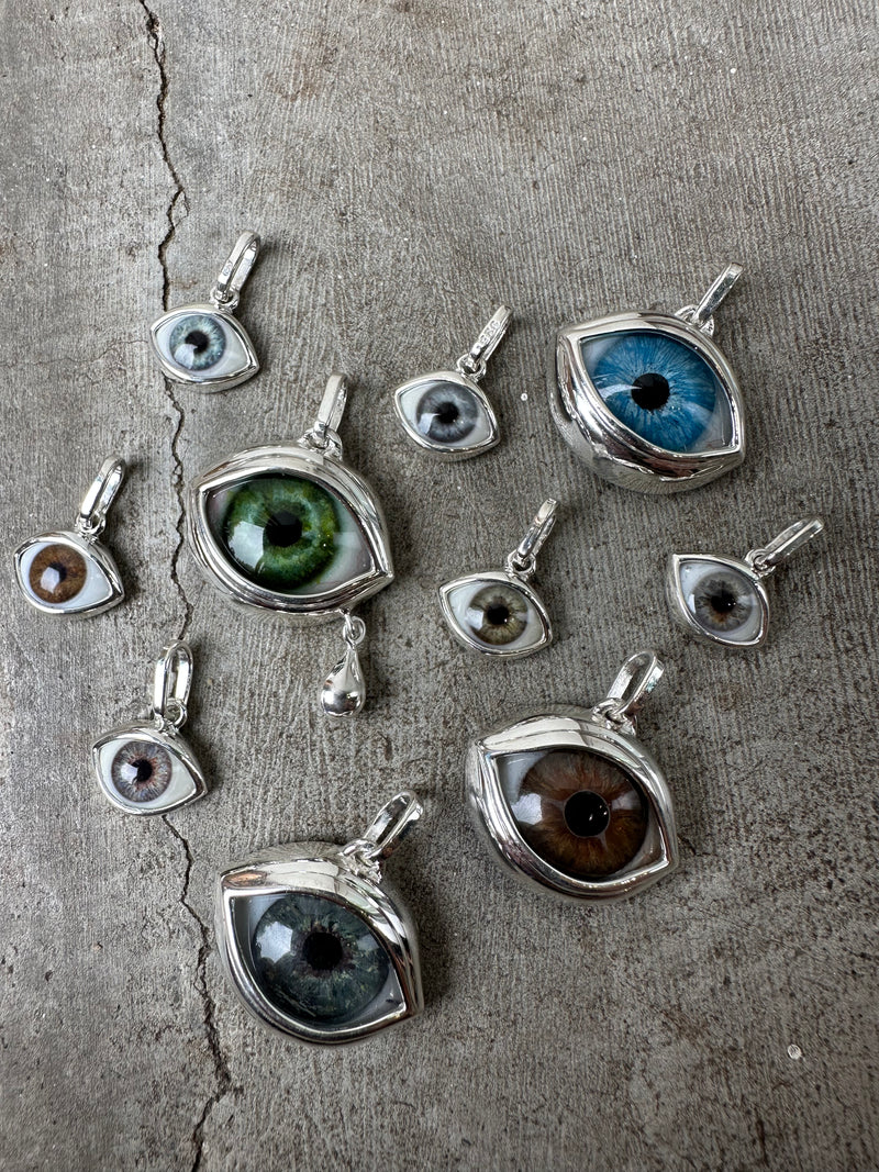 Bright blue green Silver Eye Pendant