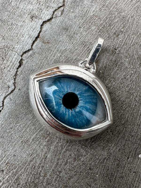 Bright blue green Silver Eye Pendant