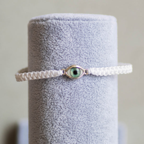 Turquoise Eye Threaded White Bracelet